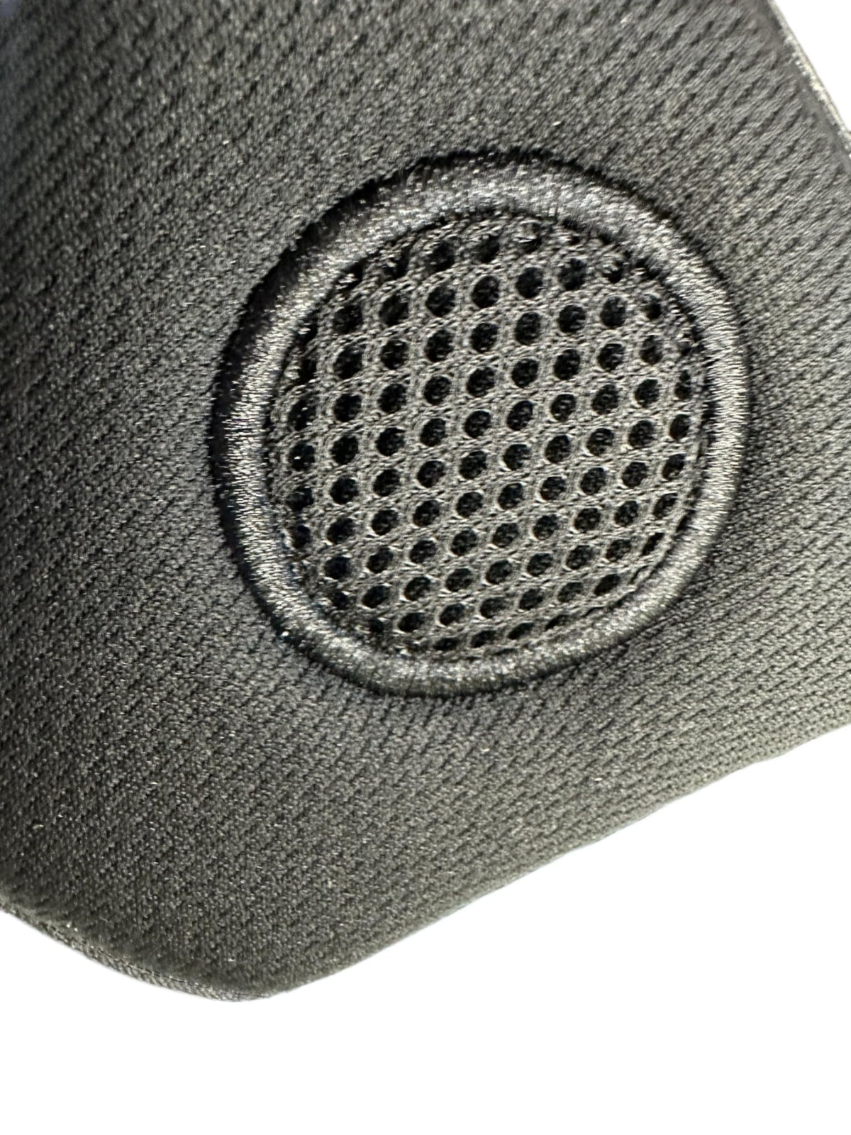 The Helmet Shop upper pigtail cord port view, tidy cable routing benefit