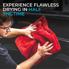 The Rag Company towel drying a boat hull for streak-free results