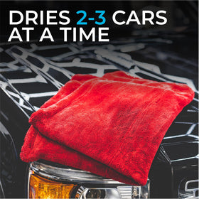 The Rag Company towel being used to dry a pickup truck for quick finish