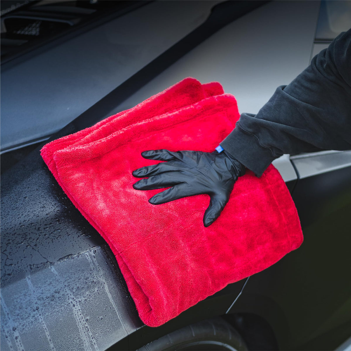 The Rag Company towel packed in a detailing bag for organized kit storage