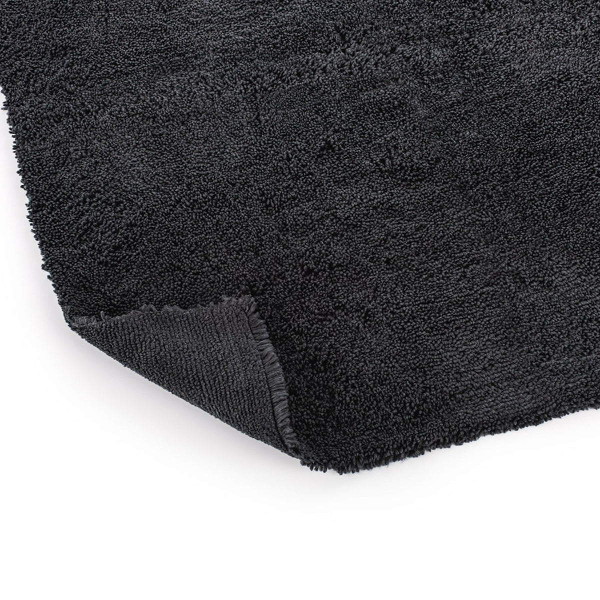 Stack of folded The Rag Company towels showing tidy storage and ready availability