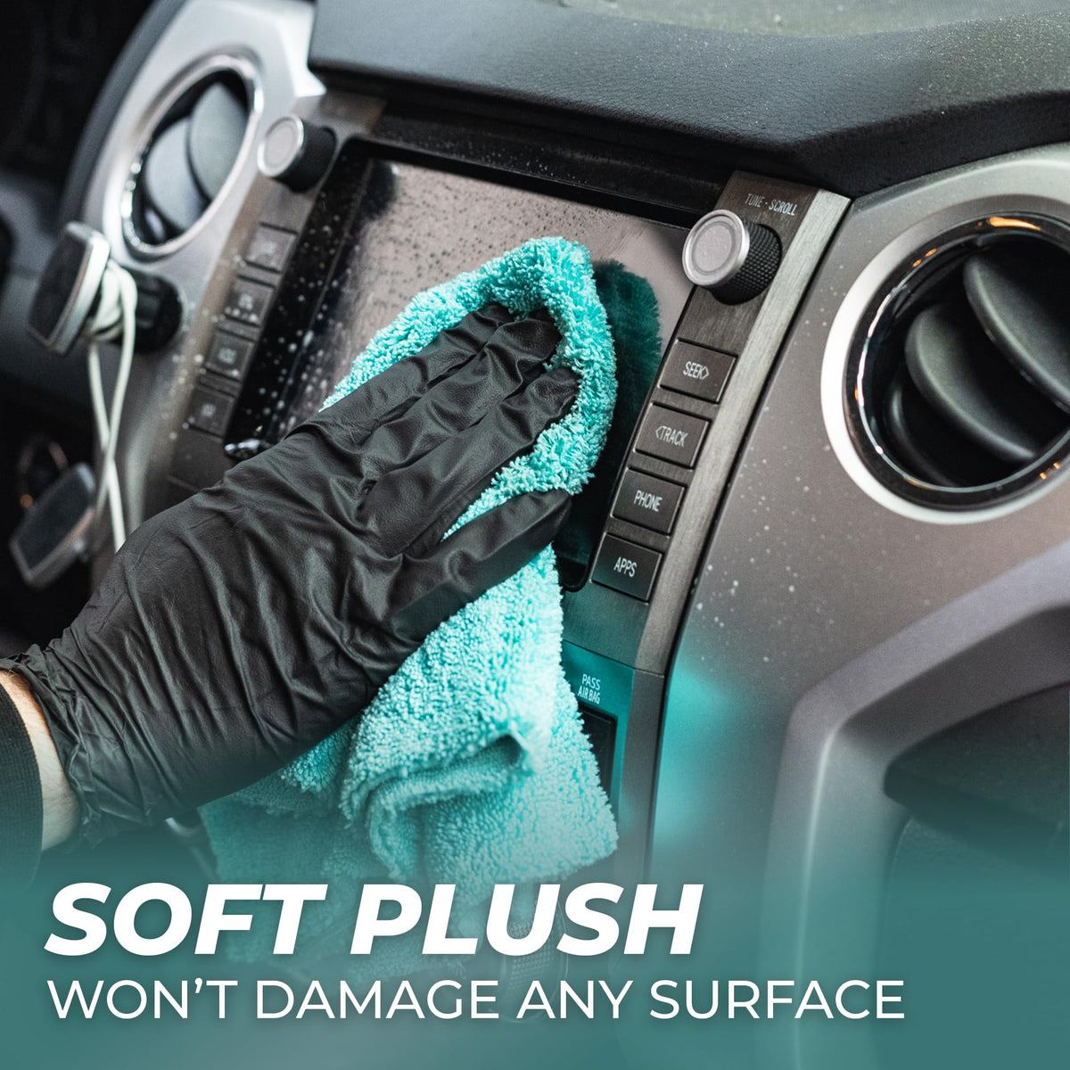 The Rag Company towel polishing glass/window delivering streak-free clarity and improved visibility