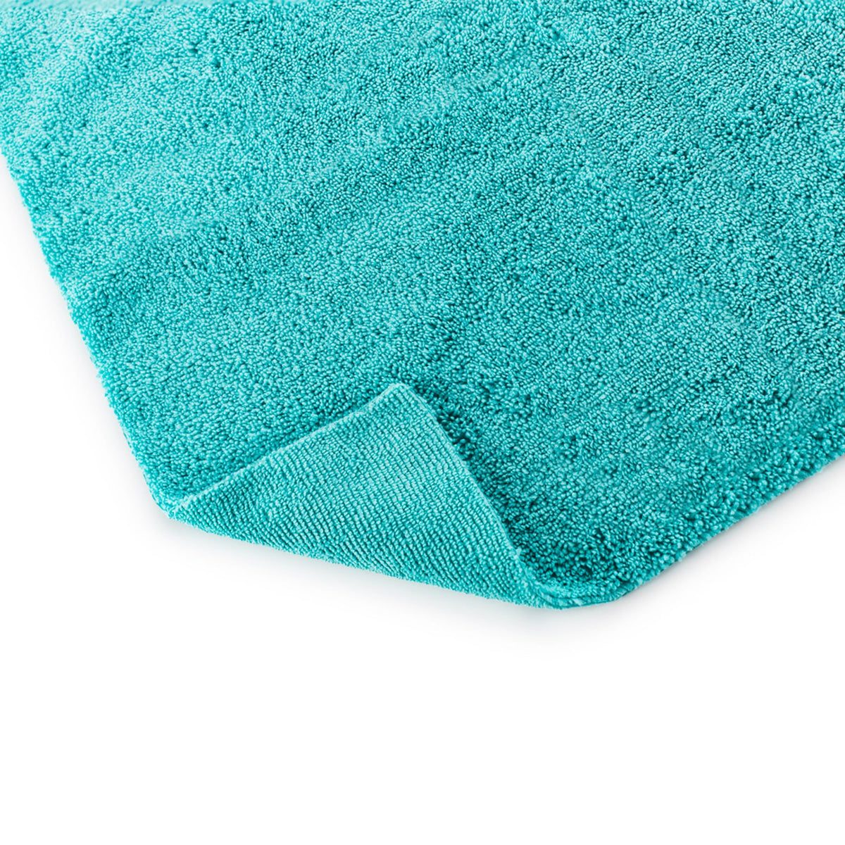 The Rag Company towel held in hand to show 16x16 size and practical handling benefit