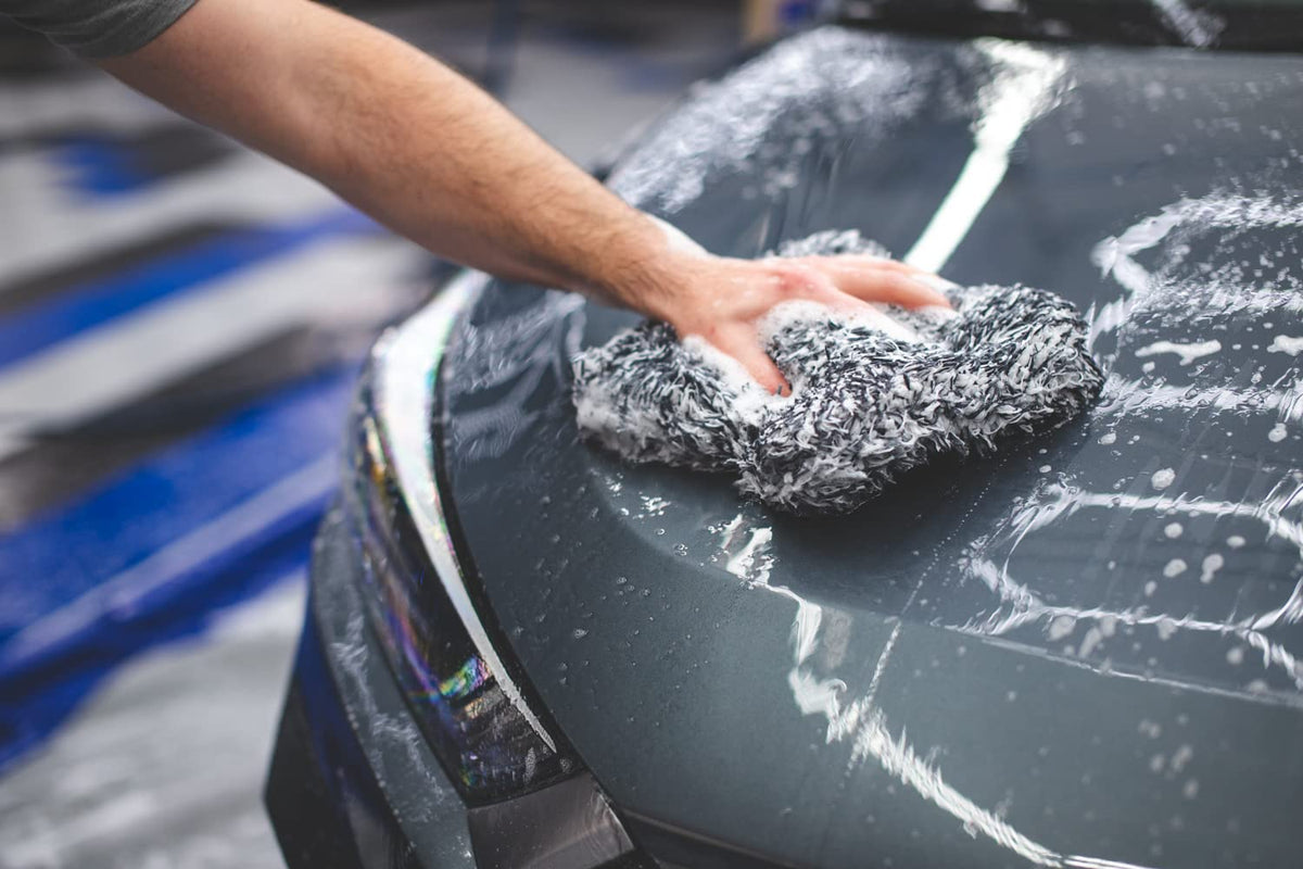 The Rag Company mitt loaded with suds holding lots of wash solution