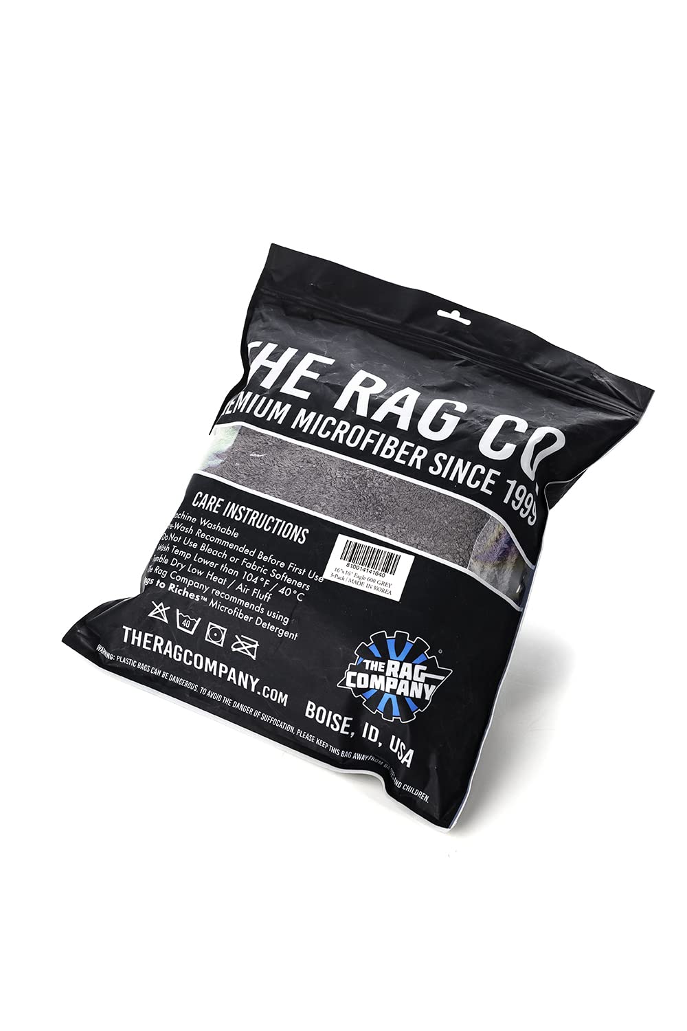 The Rag Company towel held in hand to show 16x16 size and easy control