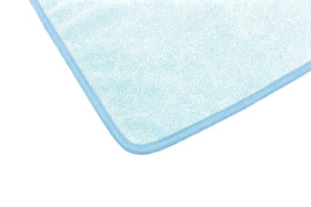 The Rag Company FTW wiping a window demonstrates streak-free clarity and easy polishing