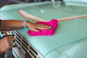 The Rag Company FTW held in hand showing 16x16 inch size and control