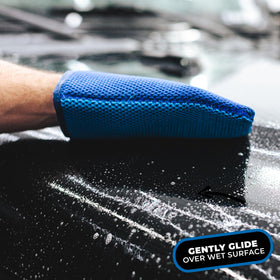 The Rag Company mitt on painted panel removing contaminants for smoother finish