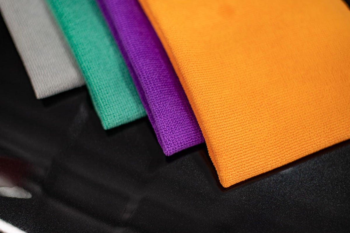 The Rag Company neatly folded towels emphasizing organized storage and durability