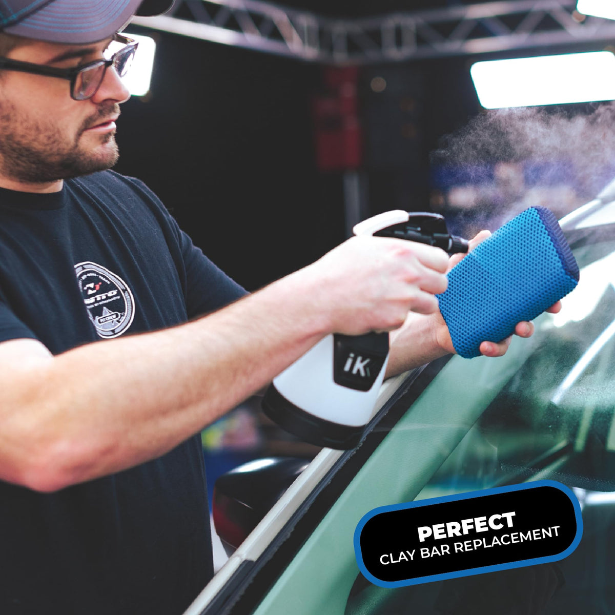 The Rag Company scrubber held in hand to show size and ergonomic control benefit