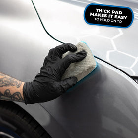 Applying coating with The Rag Company applicator on wheel spokes for controlled, even spread