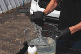 The Rag Company sponge held in hand showing scale and easy-use benefit