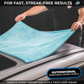 The Rag Company towel in driveway detailing scene showing professional-grade drying performance