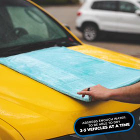 The Rag Company towel drying a car door showing safe, scratch-free water removal