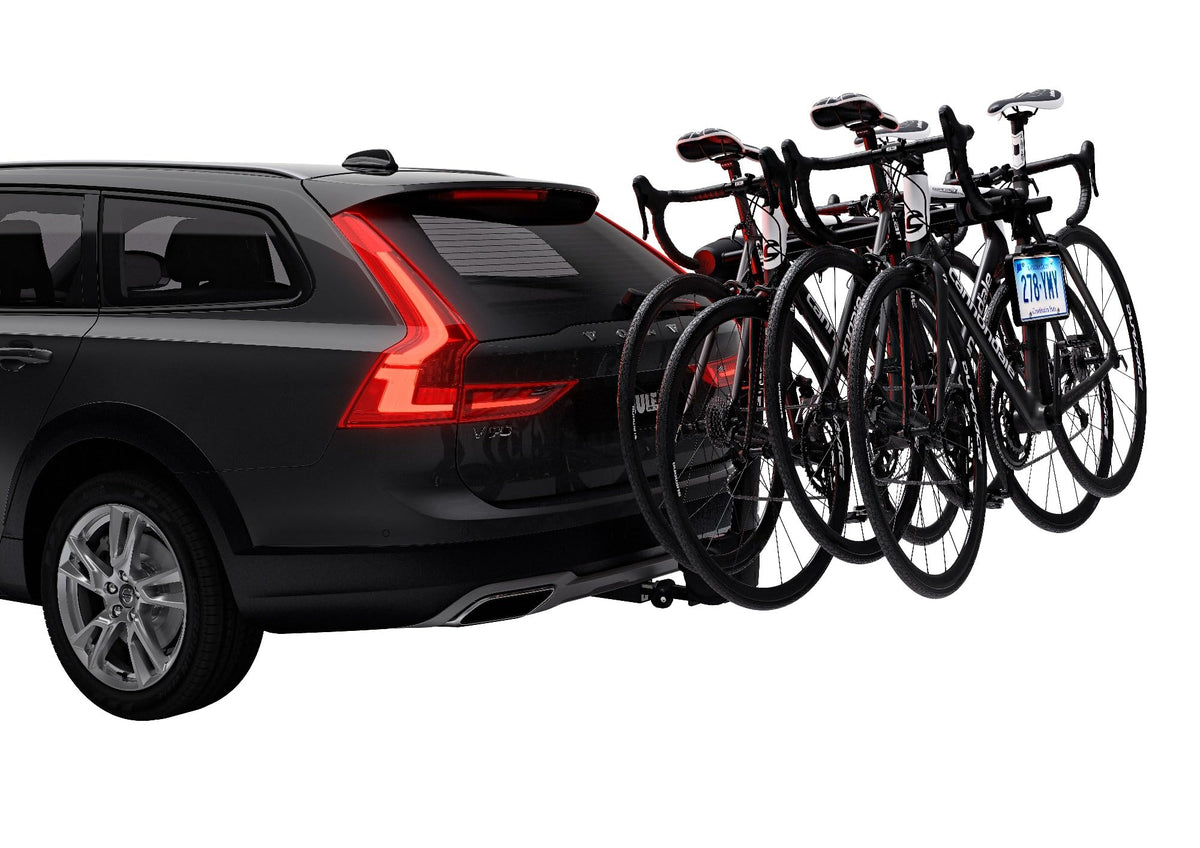 Thule license plate holder mounted on a platform carrier showing stable attachment benefit