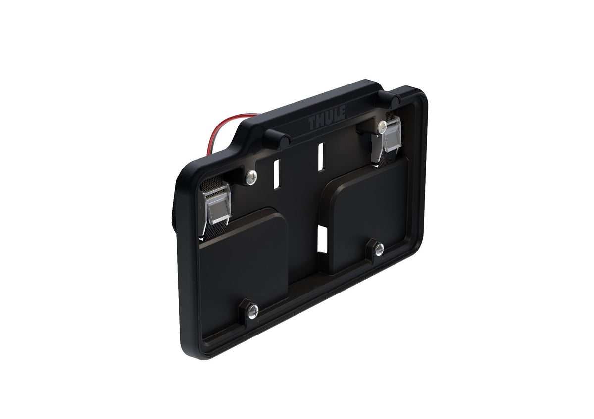 Thule license plate holder captured attachment detail showing tamper-resistant security benefit