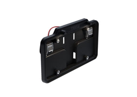 Thule license plate holder captured attachment detail showing tamper-resistant security benefit