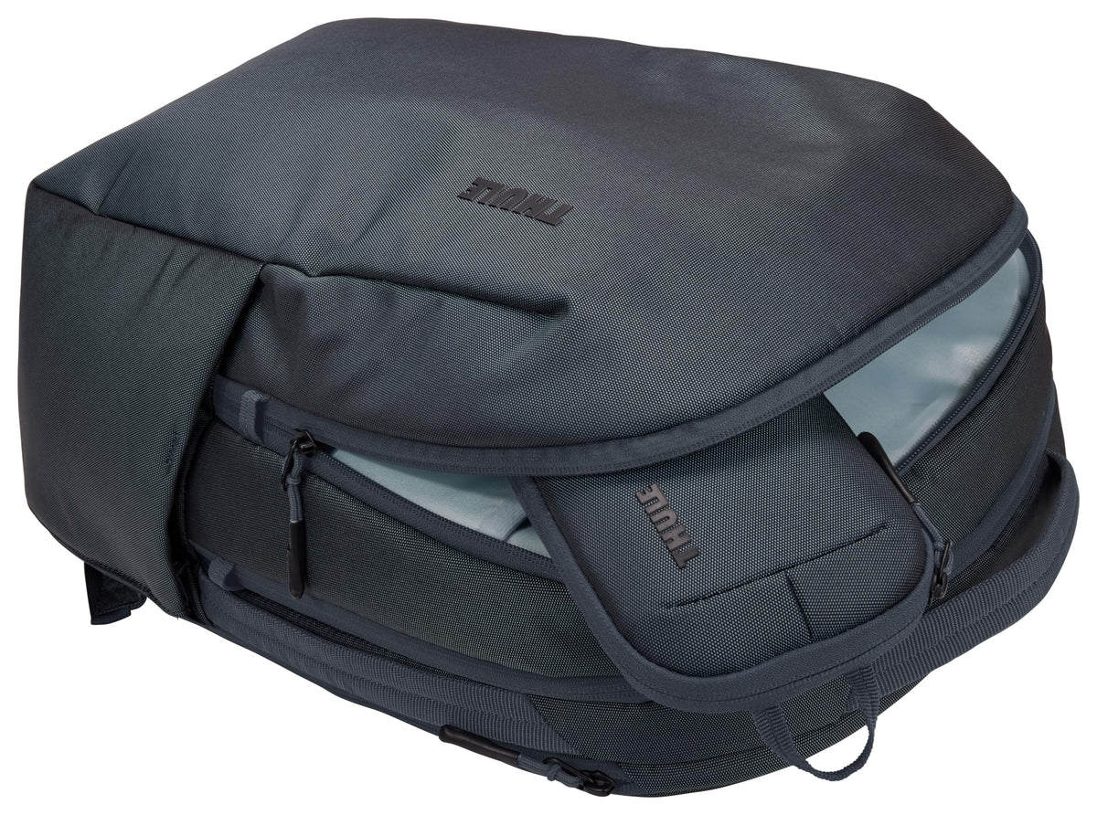 Thule Subterra PowerShuttle small next to phone for size comparison and convenience