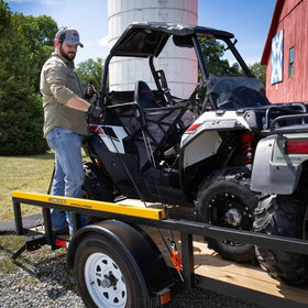 Tie Boss securing cargo on pickup showing stable load transport benefit
