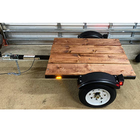 Tie Down installed on trailer showing debris protection in use