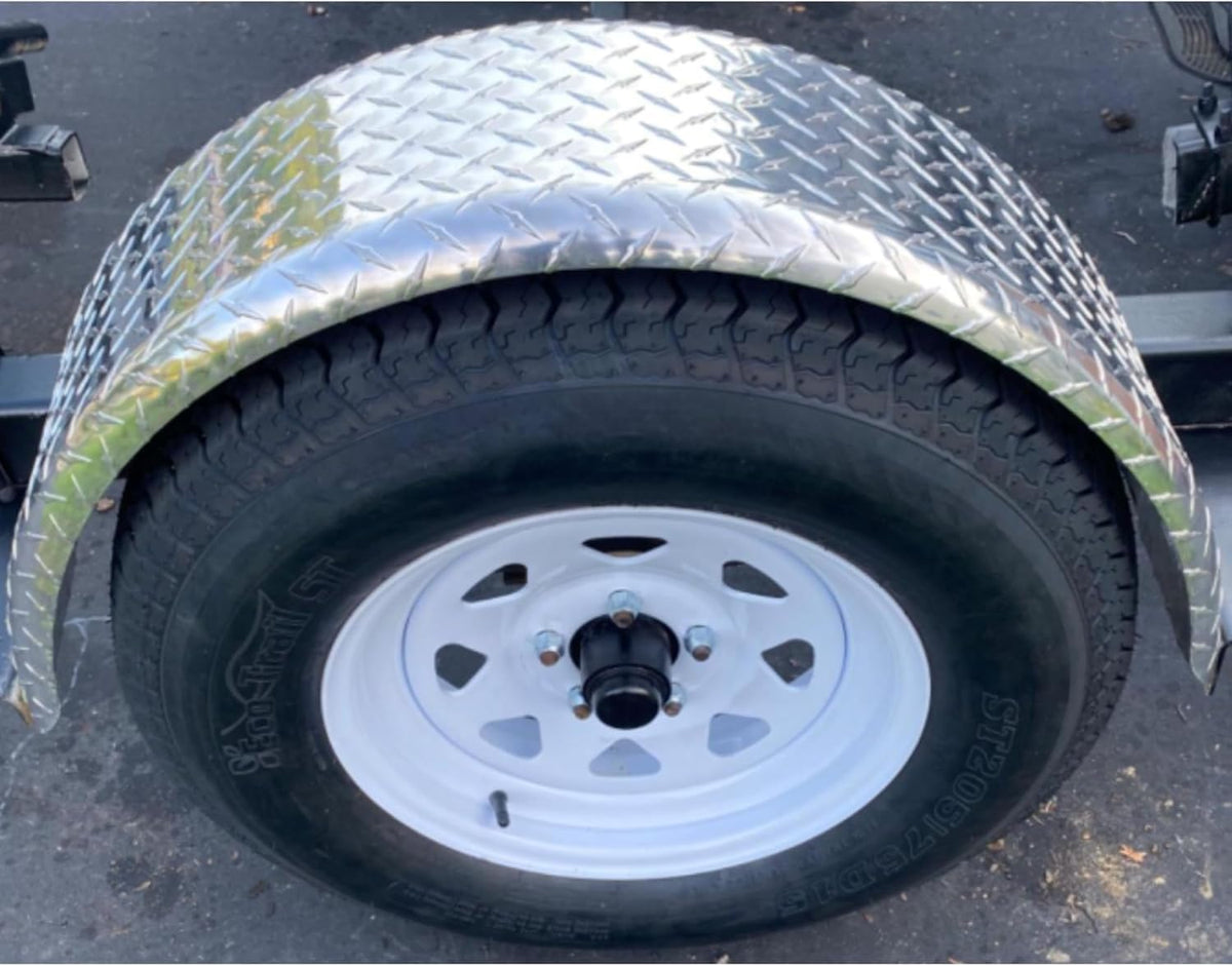 Tie Down installed on trailer in use showing durable protection on road