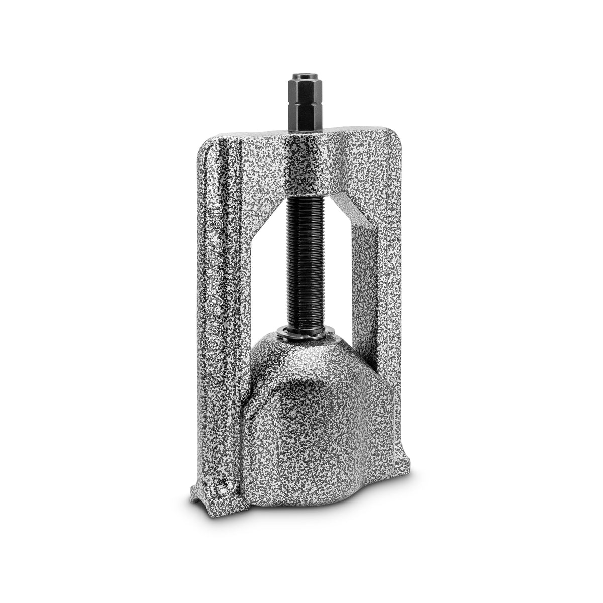 Tiger Tool 10105 pressing out a bearing cup on a driveshaft demonstrating safe extraction