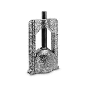 Tiger Tool 10105 pressing out a bearing cup on a driveshaft demonstrating safe extraction