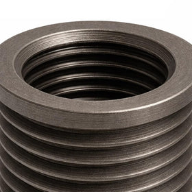TIME-SERT close-up of insert thread profile highlighting precision machining and secure fit benefit