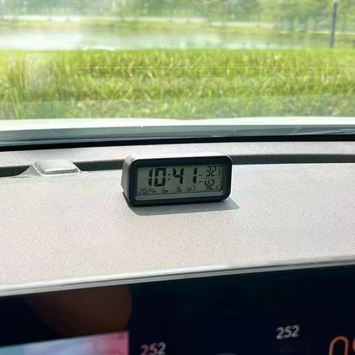 Timloon dashboard clock installed in car offering non-distracting hour and temp info