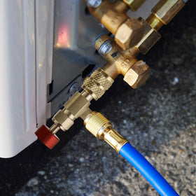 Timsec valves beside ruler showing compact size for easy portability and storage