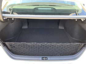 TN TrunkNets holding grocery bags in trunk to prevent spills and rolling