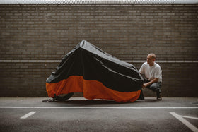 Tokept cover protecting motorcycle in driveway lifestyle setting for outdoor security