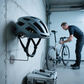 Tongyuyan helmets on wall in garage showing space-saving benefit