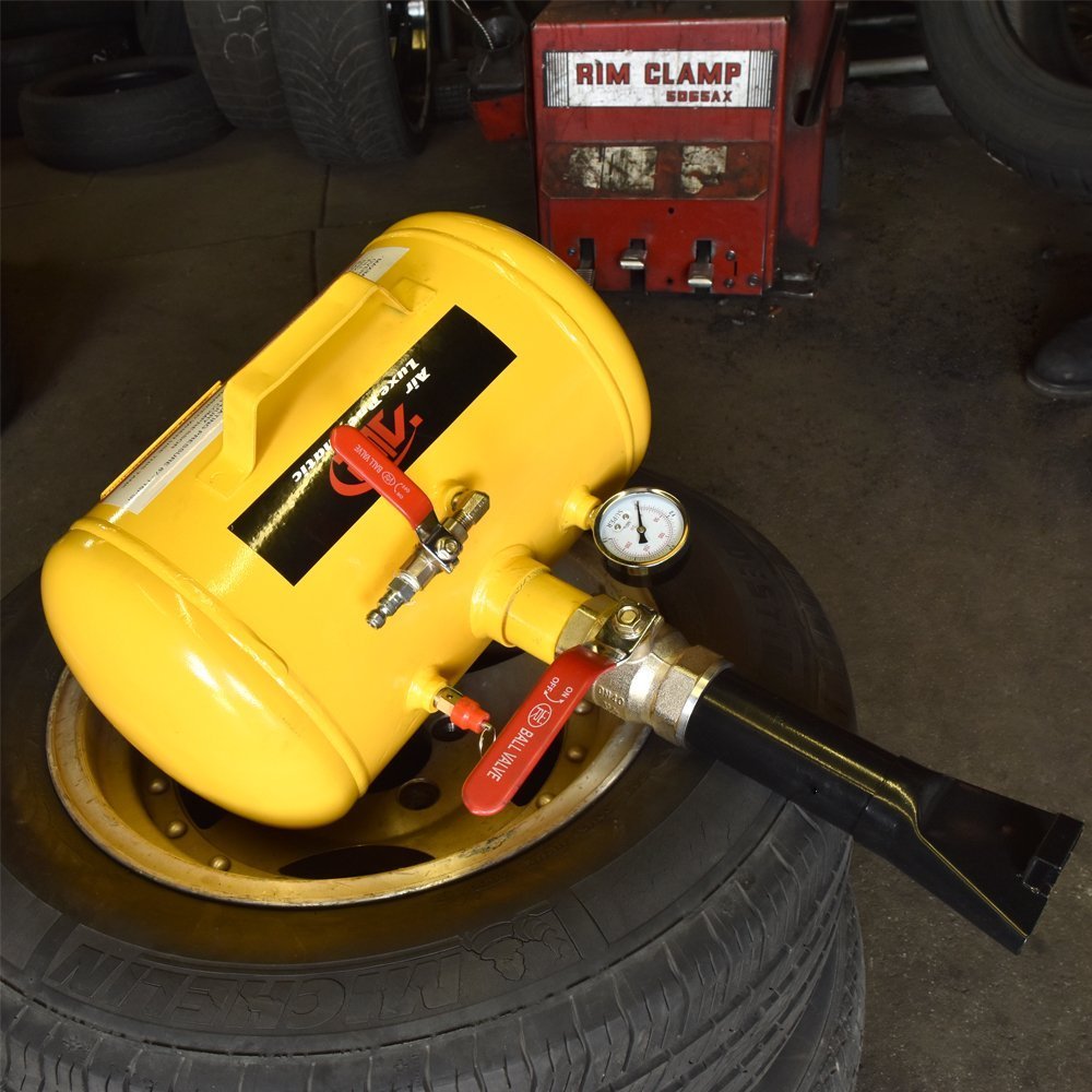 Tooluxe next to ruler showing 5‑gallon scale for correct size selection benefit