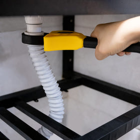 Toolwiz wrenches on a workbench next to tools showing versatile home and garage use