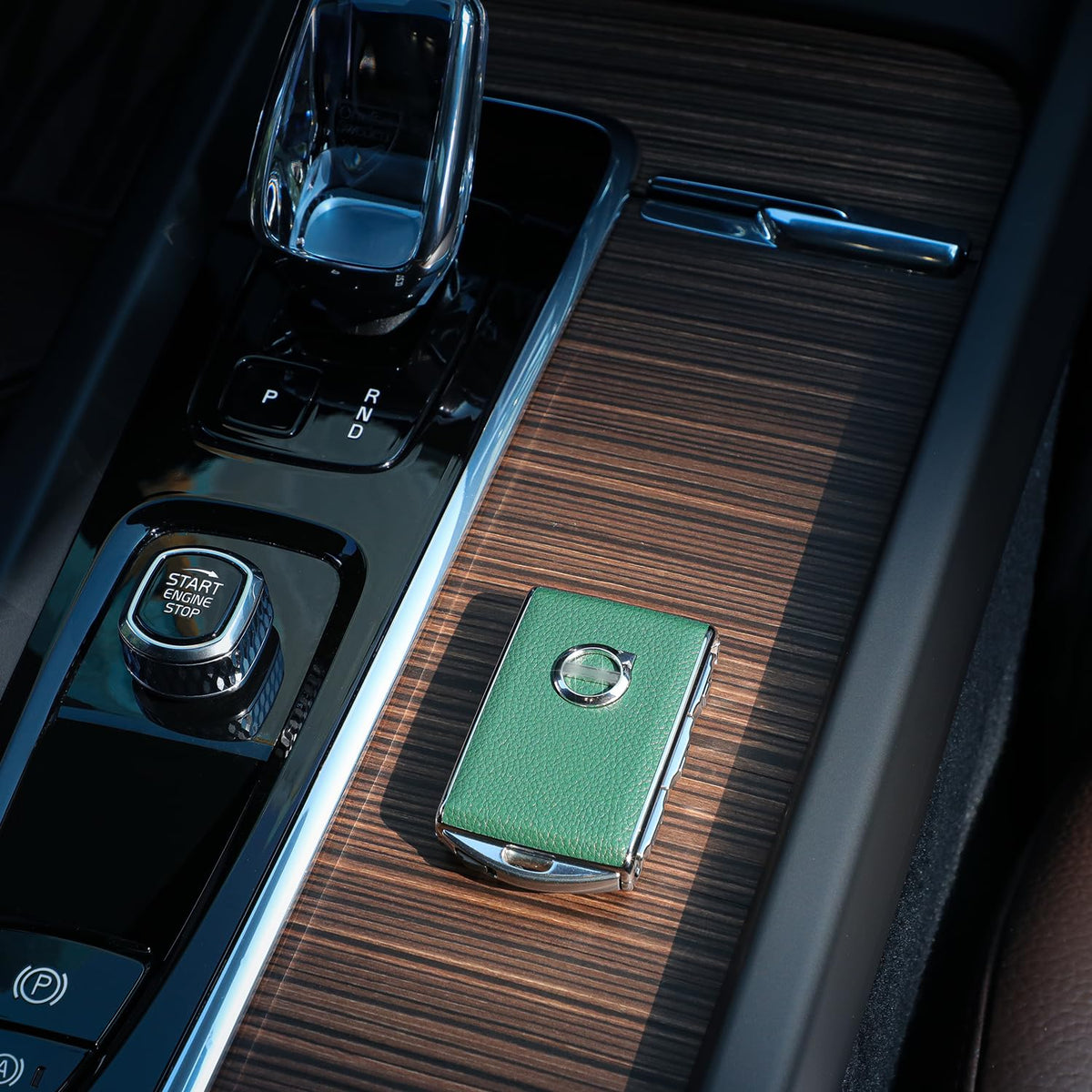 TOUPHY key cover held in hand demonstrating comfortable grip and easy access
