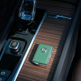 TOUPHY key cover held in hand demonstrating comfortable grip and easy access