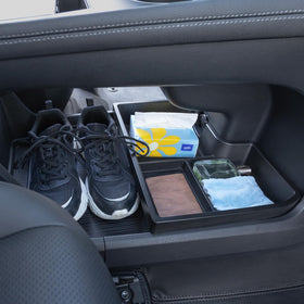 TOPINSTALL organizer next to a shoe to show scale and roomy capacity