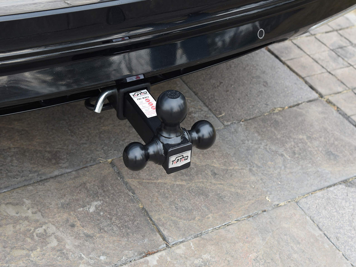 TOPTOW close-up of 1-7/8, 2 and 2-5/16 inch balls showing size markings and strength