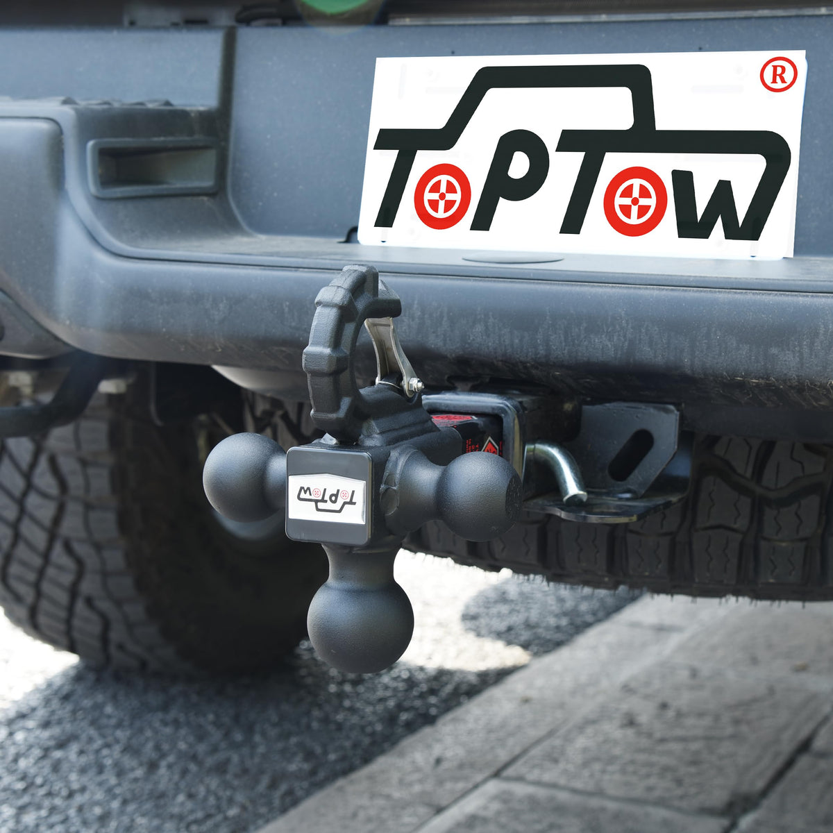 TOPTOW Beast tow hook detail with latch showing secure strap attachment benefit