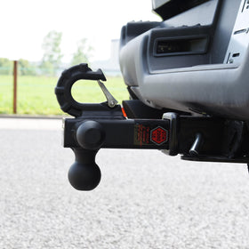 TOPTOW lifestyle image of truck towing trailer showing versatile, ready-to-use benefit