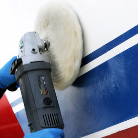 TotalBoat TotalBuff being applied on a boat bow showing rapid oxidation removal