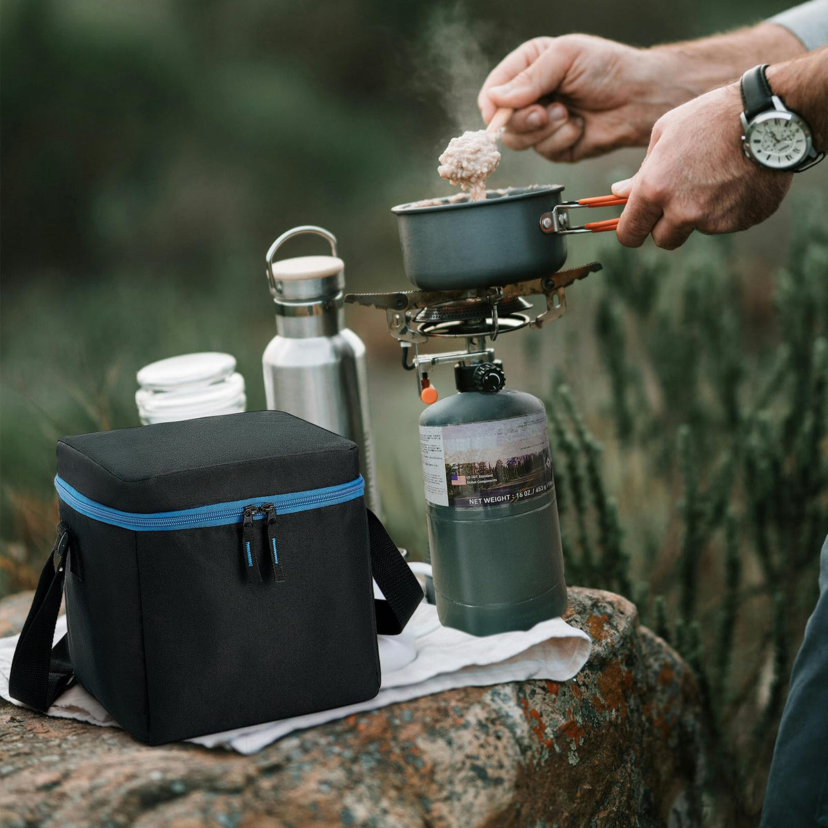 TOURCYCLE bag in a campsite setup protecting fuel and streamlining gear