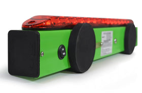 TowMate 4-pin round transmitter plugged into trailer socket for wireless signaling