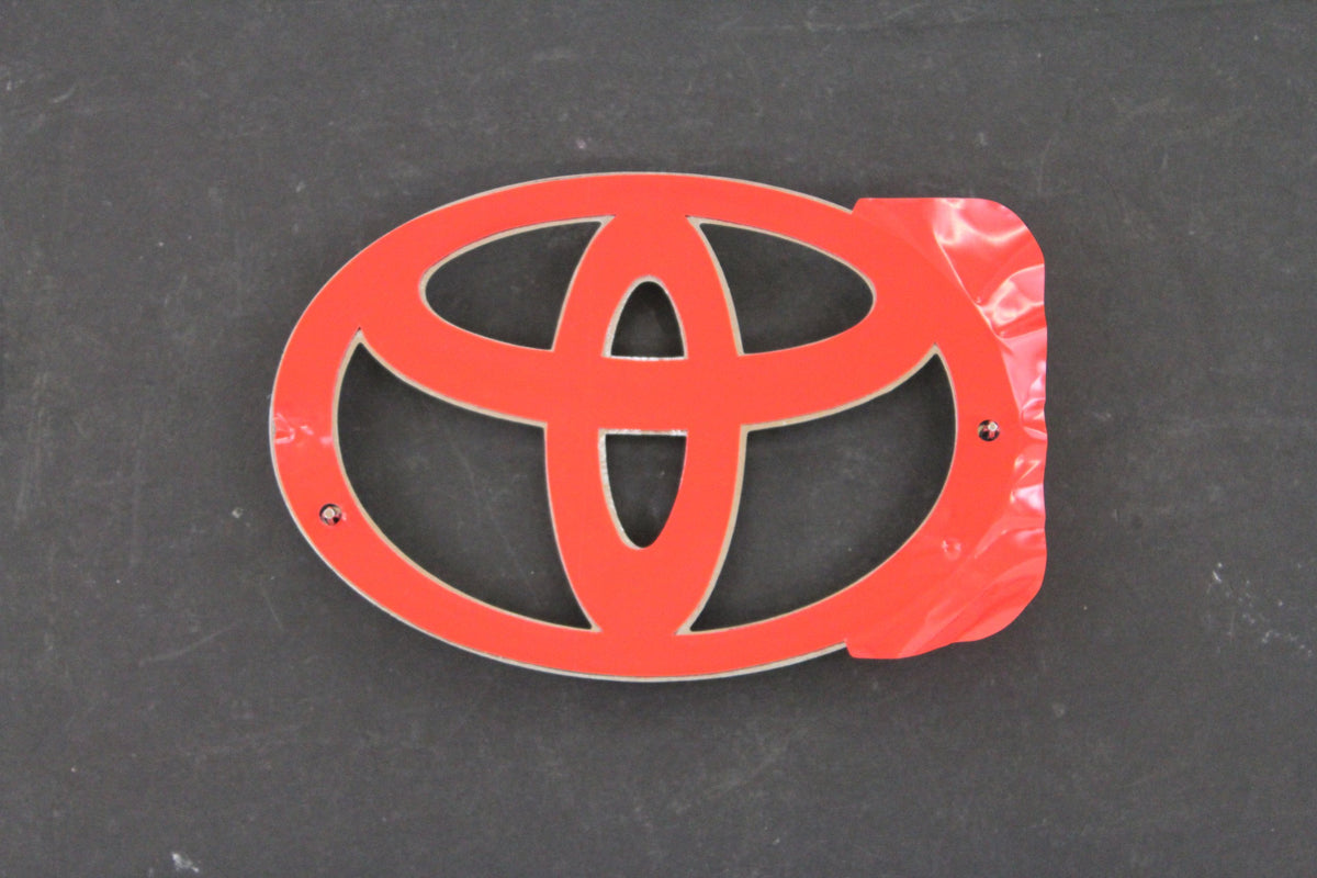 Toyota 75432-06030 adhesive backing close-up for easy, secure installation