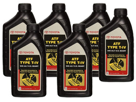 Toyota automatic transmission fluid pouring into a funnel, illustrating clean transfer and reduced contamination risk