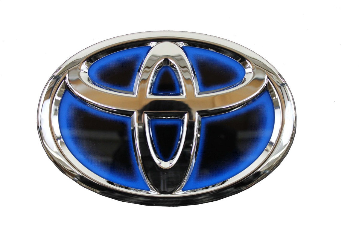 Toyota emblem on grille showing factory fit and restored front-end appearance