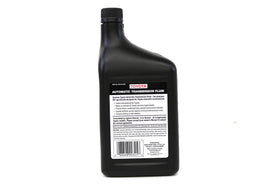 Toyota Genuine Fluid 00718ATF00 pouring into transmission with measurable quart scale for accurate topping