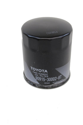 Toyota oil filter front view showing label and OEM fit for proper protection