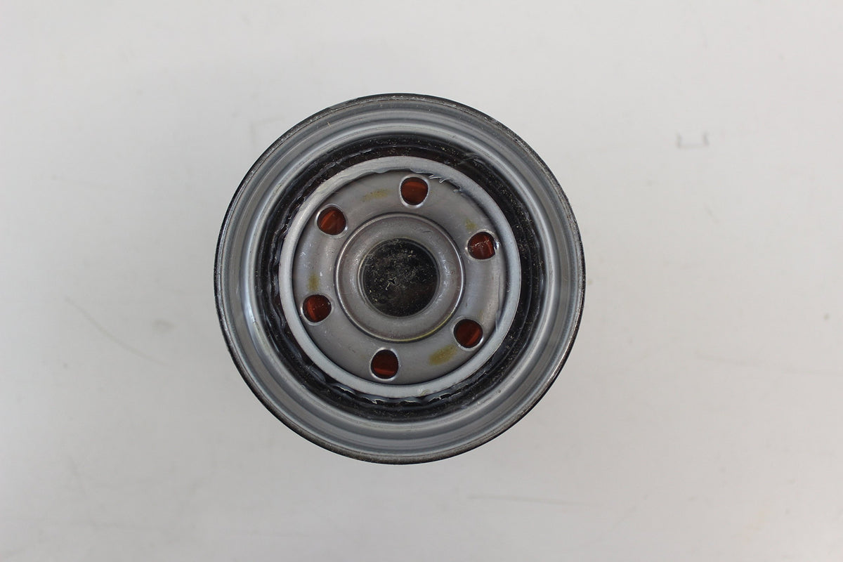 Toyota oil filter mounted in engine bay demonstrating OEM fit and reliable sealing